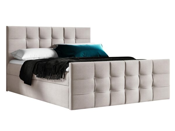 Beżowe łóżko tapicerowane z pikowaniem