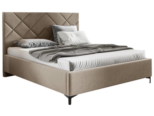 Łóżko tapicerowane w kolorze beżowym z pikowanym zagłówkiem – luksusowe łóżko do sypialni, które wprowadza elegancję do wnętrza.