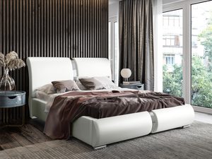 Miniaturka 2 - Białe łóżko ze skórzanym zagłówkiem i poduszkami, elegancka aranżacja.