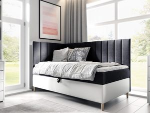 Miniaturka 11 - Czarno-białe łóżko z pionowym przeszyciem – klasyczna forma z kontrastem.