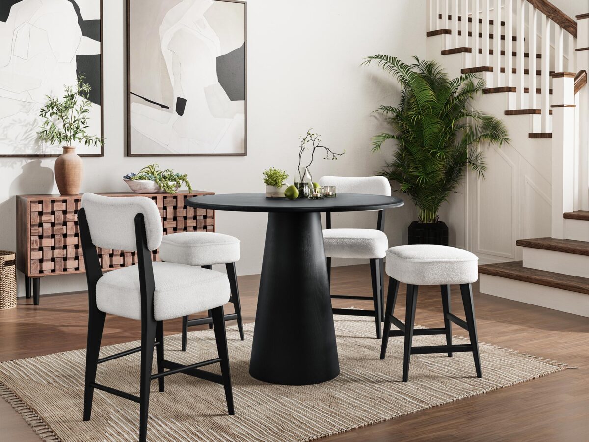 Nowoczesny okrągły stół z czarnym blatem do eleganckiego wnętrza