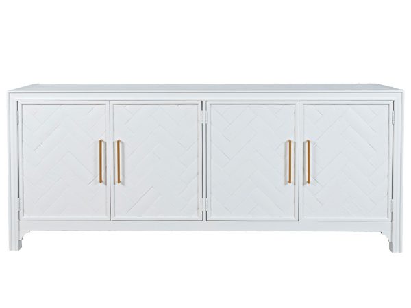 Nowoczesna komoda z białym frontem w jodełkę i złotymi uchwytami