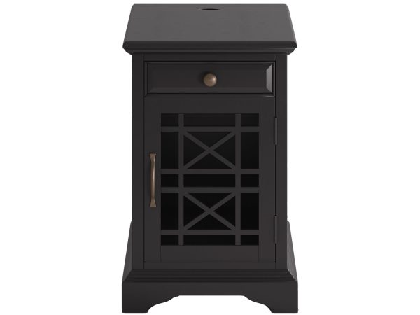 Klasyczna szafka nocna w czarnym wykończeniu z dekoracyjnymi drzwiczkami