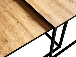 Miniaturka 6 - Widok z góry na blat z naturalnego drewna i czarne nogi