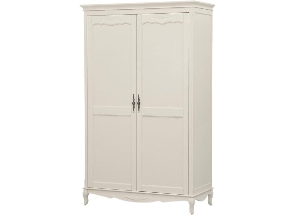 Klasyczna biała szafa z ozdobnymi frezami i wysokimi nóżkami