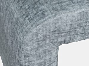 Miniaturka 1 - Zbliżenie na szarą pufę boucle z grubą tapicerką