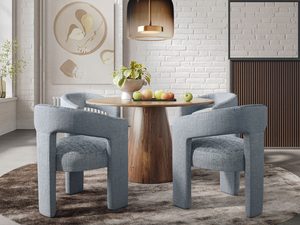 Miniaturka 2 - Jadalnia z niebieskimi krzesłami boucle i okrągłym stołem