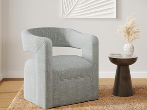 Miniaturka 3 - Nowoczesny szary fotel tapicerowany w minimalistycznym wnętrzu