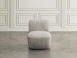 Miniaturka 1 - Fotel kremowy o zaokrąglonym kształcie, widok z przodu