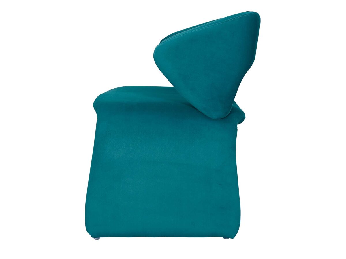 Turkusowy fotel welurowy futurystyczny ujęcie boczne Turkusowy fotel welurowy futurystyczny ujęcie boczne