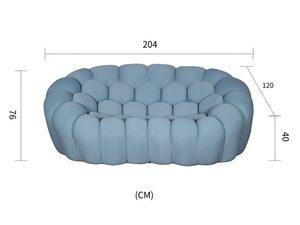 Miniaturka 2 - Designerska sofa błękitna z pikowaniami do nowoczesnego salonu