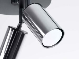 Miniaturka 6 - Detal chromowanego cylindrycznego reflektora plafonu z widoczną żarówką zbliżenie