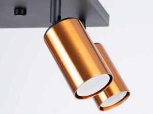 Miniaturka 6 - Detal miedzianego cylindrycznego reflektora plafonu z widocznym wnętrzem zbliżenie