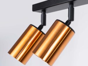 Miniaturka 5 - Detal dwóch złotych reflektorów cylindrycznych plafonu sześciopunktowego zbliżenie