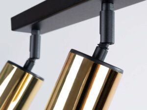Miniaturka 3 - Detal przegubowego mocowania złotych reflektorów plafonu sufitowego zbliżenie