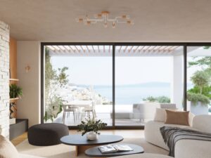 Miniaturka 10 - Kinkiet z drewnianą oprawką w aranżacji salonu z widokiem na morze