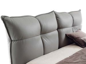 Miniaturka 4 - Szare łóżko detal miękkiego zagłówka tapicerowanego zbliżenie