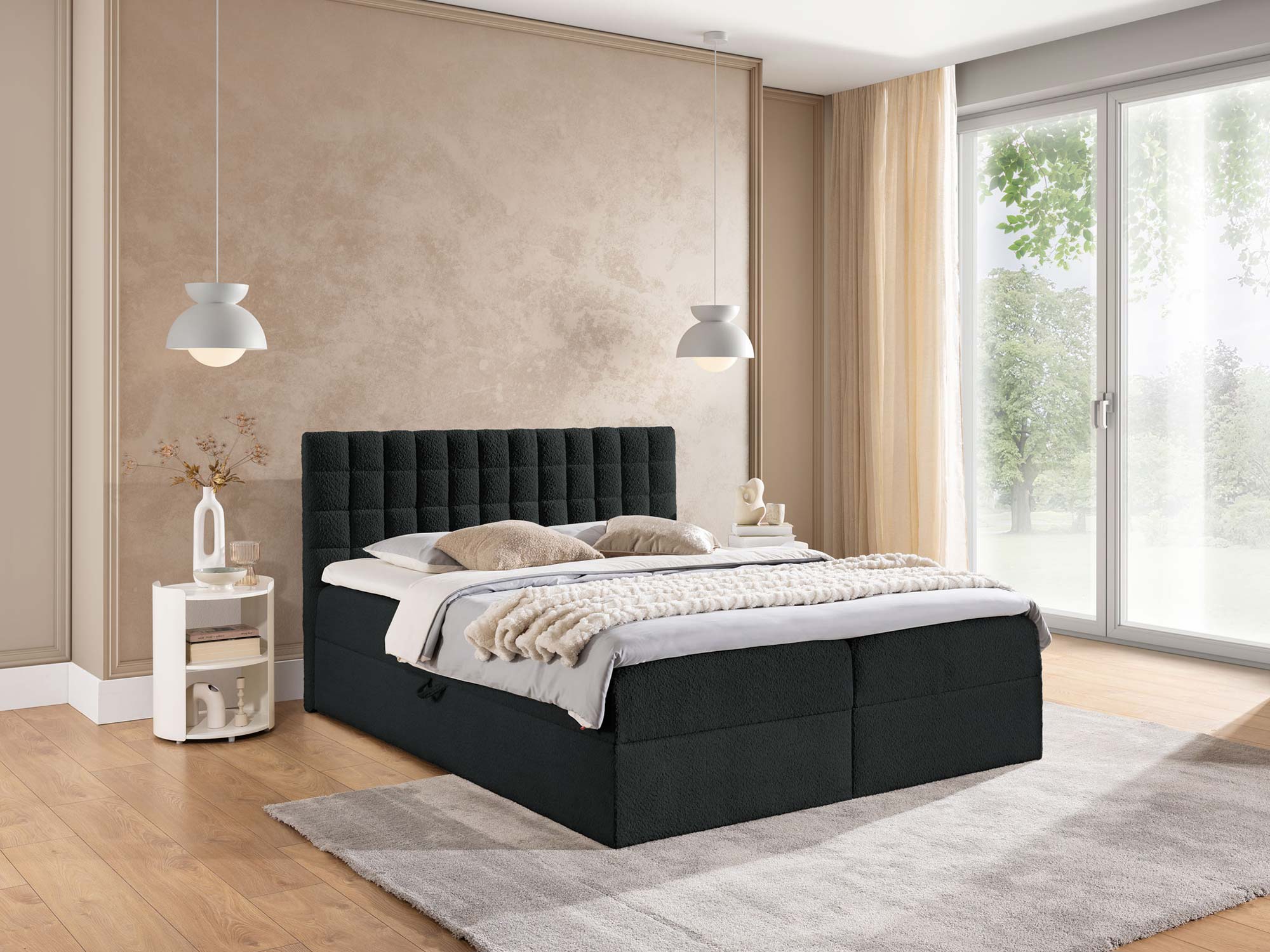 Czarne łóżko tapicerowane z pikowanym zagłówkiem