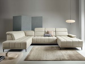 Miniaturka 10 - Kremowy narożnik w kształcie U pikowany w minimalistycznym salonie