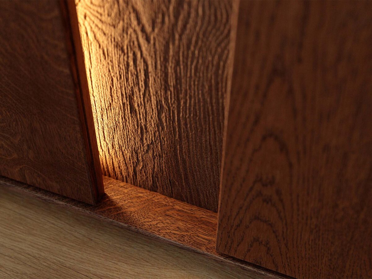 Detal podświetlenia LED i usłojenia drewna komody tabacco zbliżenie Detal podświetlenia LED i usłojenia drewna komody tabacco zbliżenie