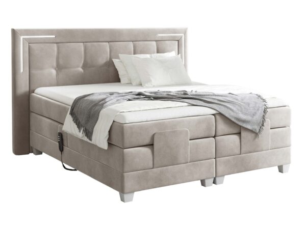 Łóżko kremowe z elektryczną regulacją w eleganckiej sypialni