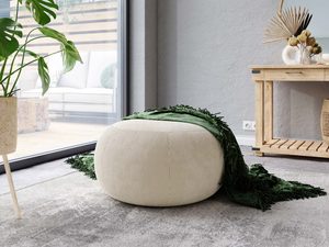 Miniaturka 3 - Kremowa pufa tapicerowana sztruks okrągła w nowoczesnym salonie