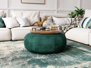 Miniaturka 1 - Zielona pufa welurowa okrągła jako stolik kawowy w salonie