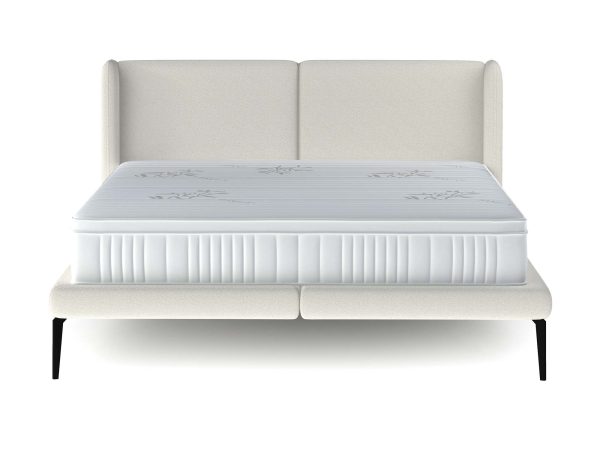 Łóżko tapicerowane na wysokich nogach Tessina