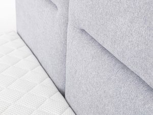 Miniaturka 4 - Zagłówek tapicerowany szary detal tkaniny i szwów zbliżenie