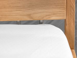 Miniaturka 5 - Detal zagłówka drewnianego łóżka dębowego połączenie z ramą zbliżenie