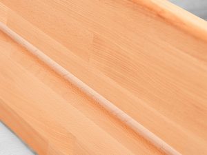 Miniaturka 7 - Detal zagłówka dwuczęściowego łóżka bukowego usłojenie drewna zbliżenie