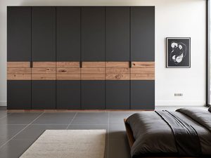Miniaturka 6 - Szafa grafitowa z dębowymi szufladami w minimalistycznej sypialni z obrazem aranżacja