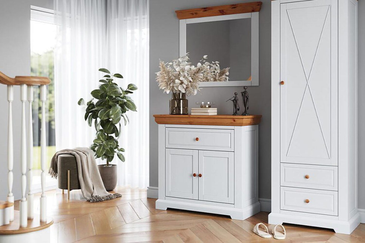 Przedpokój z białymi meblami z drewnianym blatem komodą i lustrem