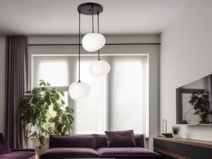 Miniaturka 1 - Lampa wisząca Delado z trzema akrylowymi kloszami i okrągłą podstawą w aranżacji salonu