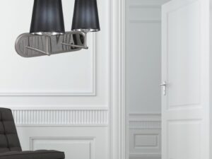 Miniaturka 2 - Satynowy kinkiet Lavonira z czarnymi abażurami na jasnej ścianie salonu