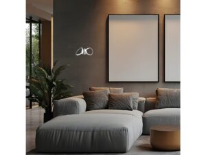 Miniaturka 3 - Chromowany kinkiet LED na ścianie nowoczesnego salonu z sofą