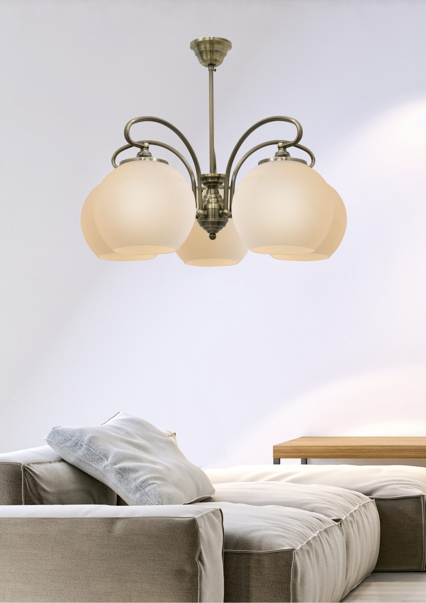 Lampa wisząca Amodeta w salonie nad beżową kanapą