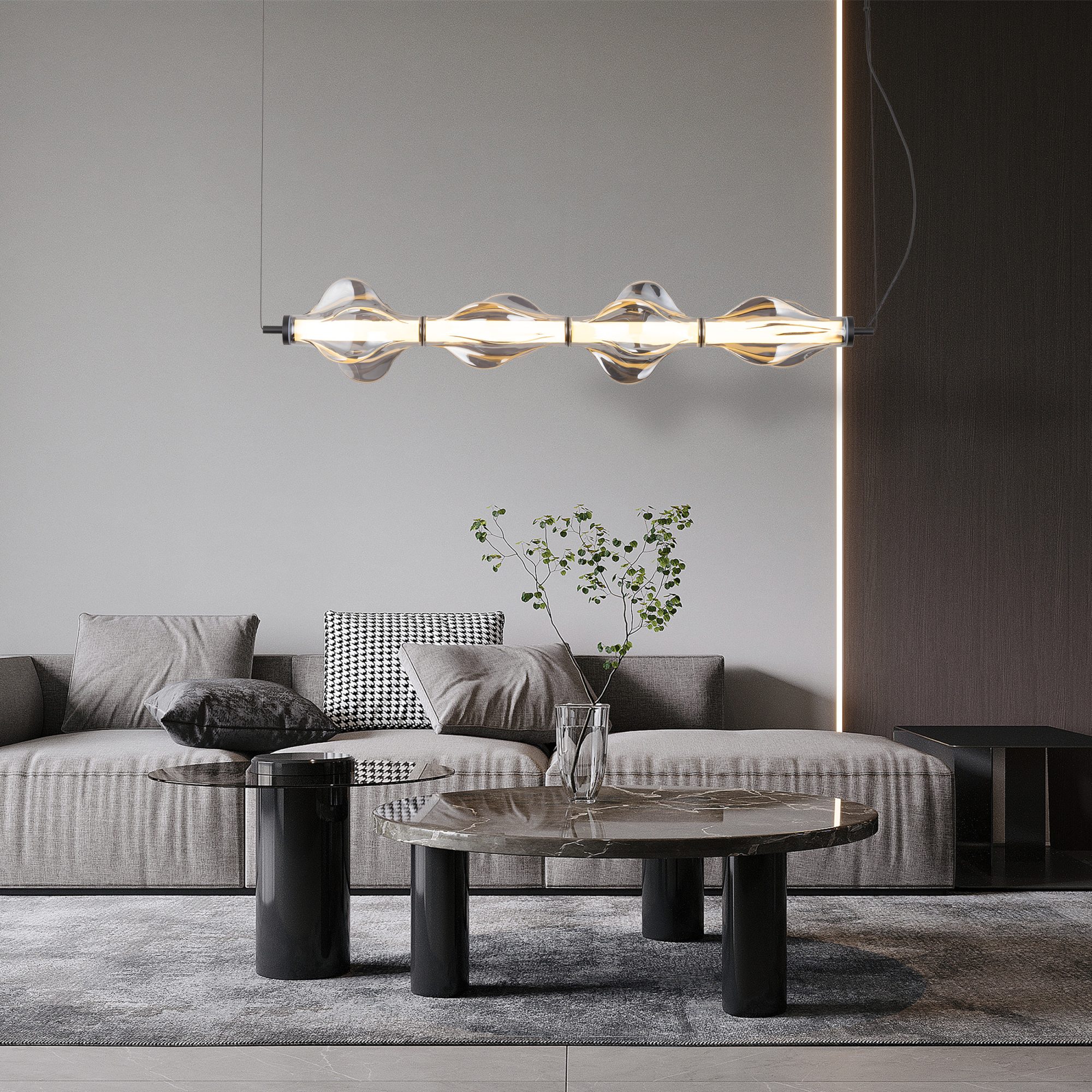 Lampa wisząca Elva w czarnej wersji nad stolikiem w salonie
