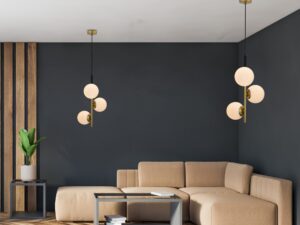 Miniaturka 5 - Dwie lampy wiszące Evosano czarno złote w salonie