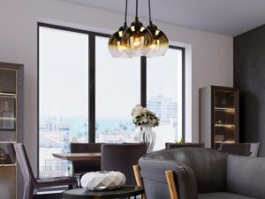 Miniaturka 1 - Lampa wisząca Galeta z trzema złotymi kloszami w nowoczesnym salonie