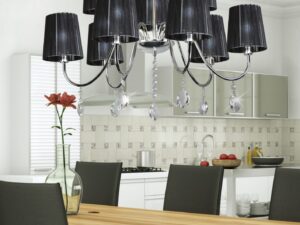Miniaturka 2 - Czarna lampa wisząca Miresio nad drewnianym stołem w jadalni
