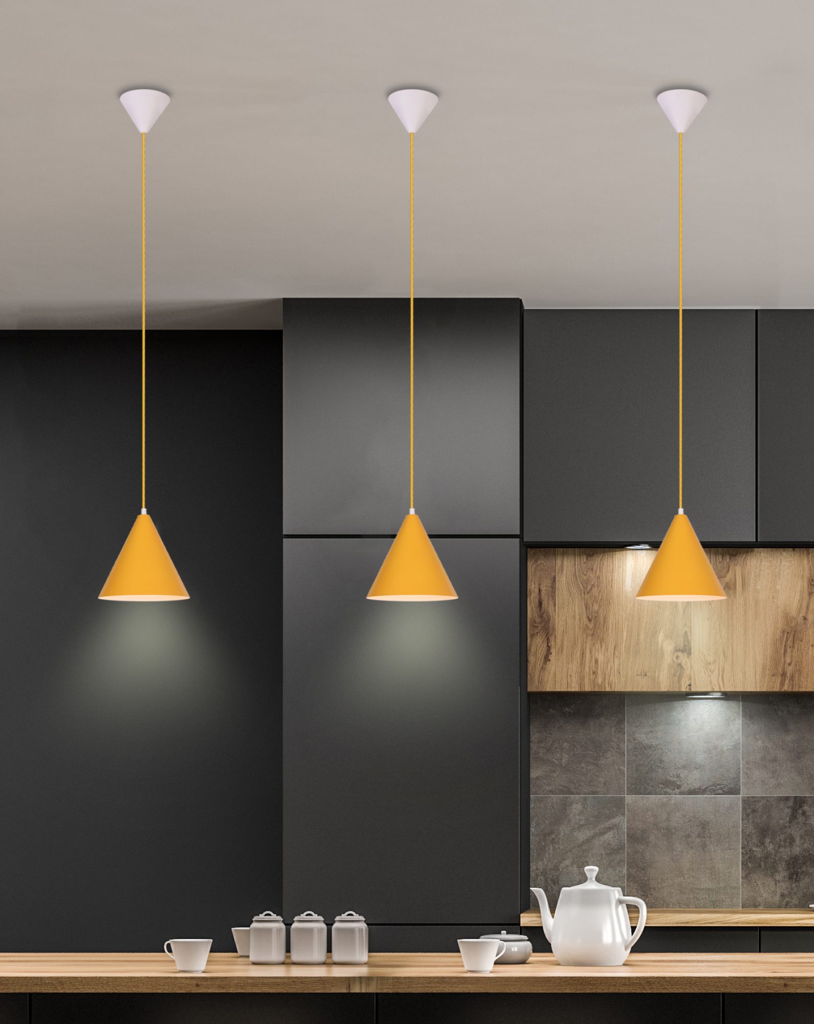 Żółte lampy wiszące Silero nad blatem kuchennym