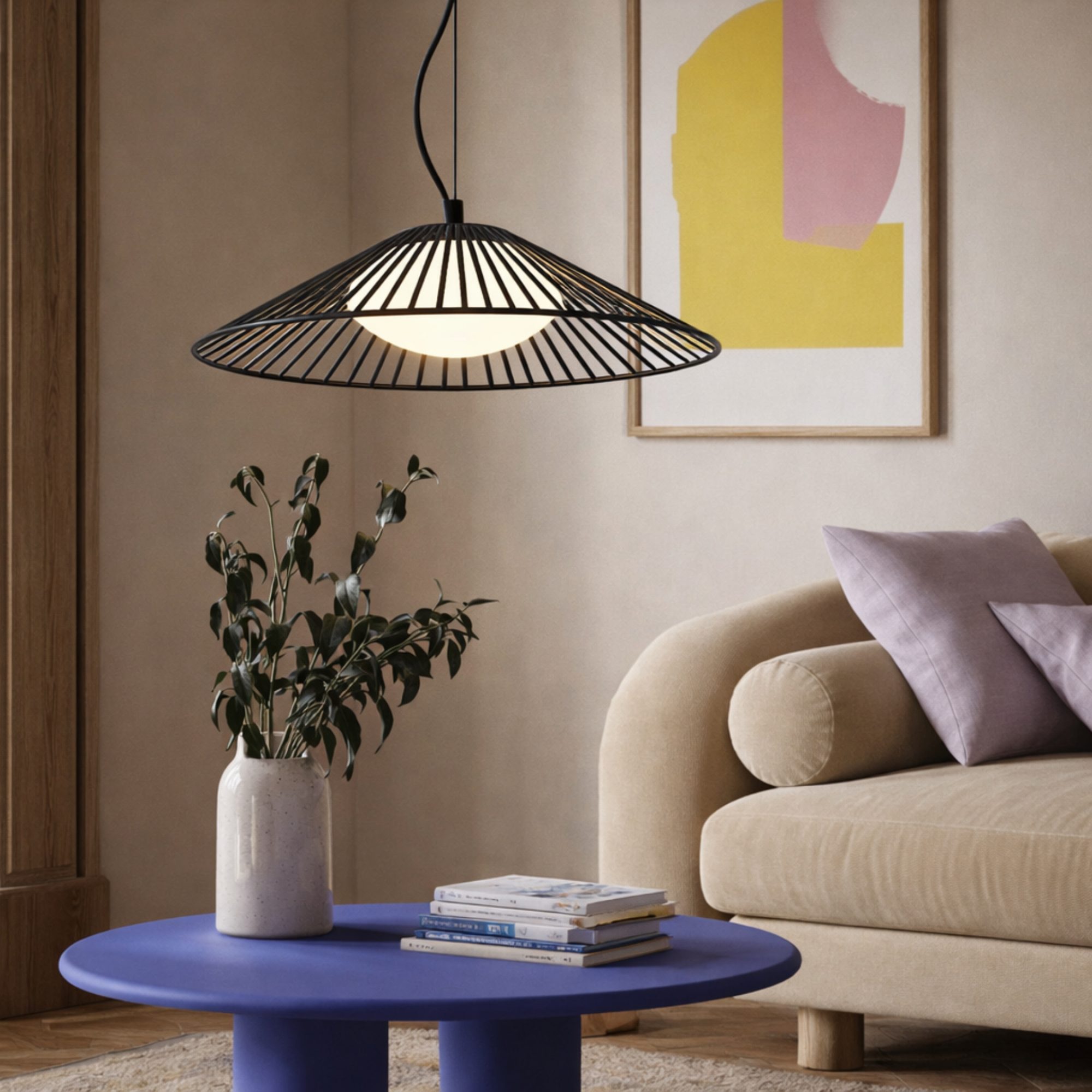 Lampa wisząca Velono 50 cm nad niebieskim stolikiem w salonie