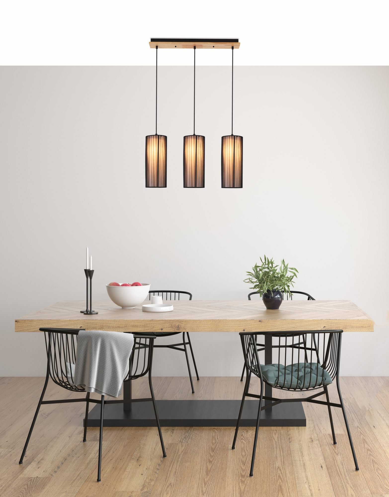Lampa wisząca Vesodia nad drewnianym stołem w jadalni
