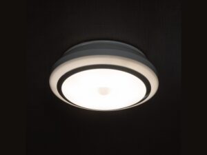 Miniaturka 2 - Okrągła lampka meblowa LED 0,5 W z zapalonym źródłem światła, widok z boku
