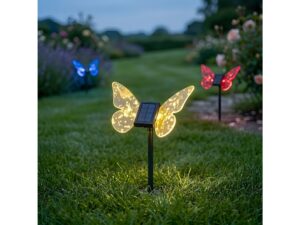 Miniaturka 1 - Lampka solarna motyl RGB świecąca pośród trawnika i kwiatów