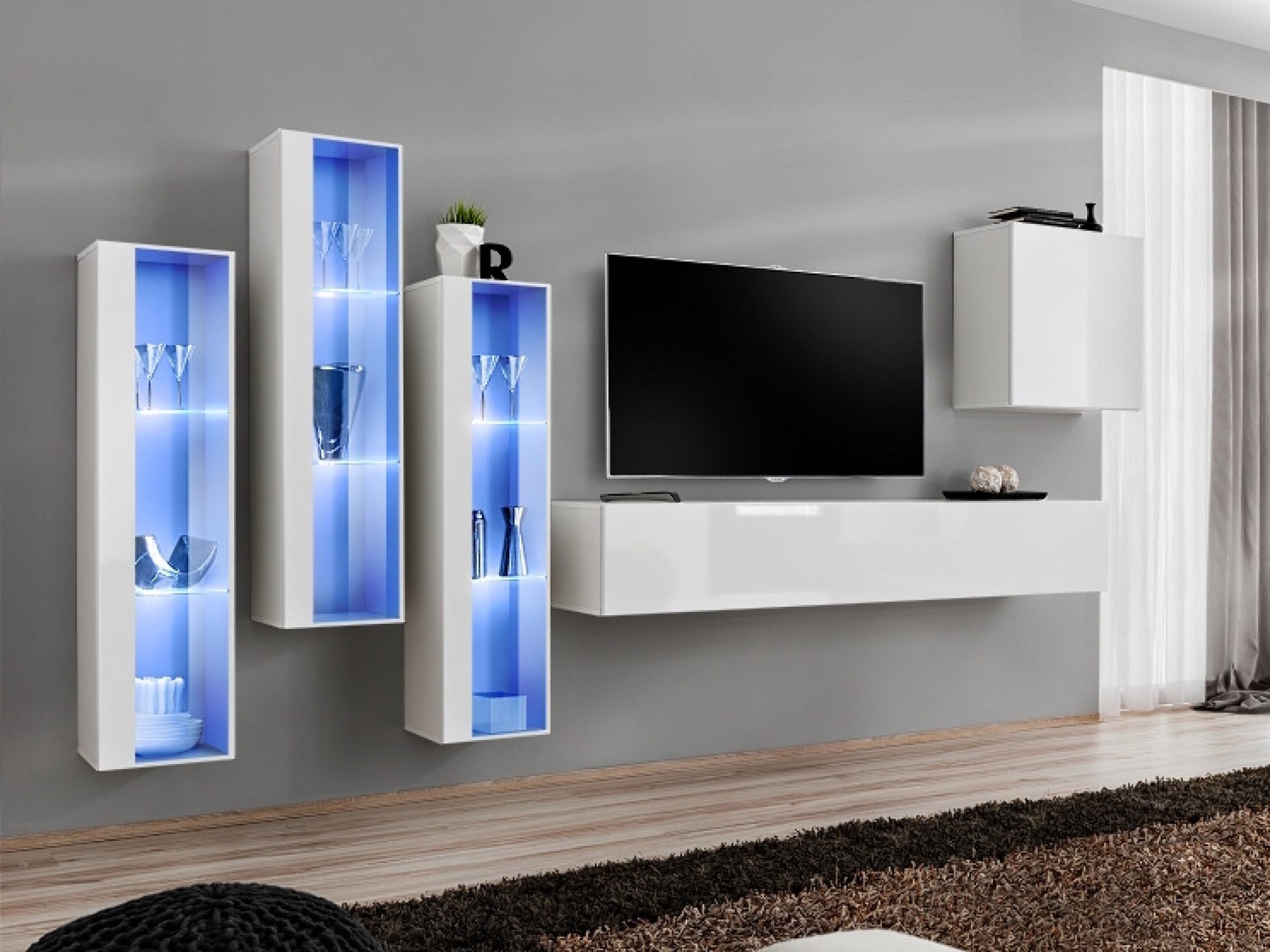 Meblościanka Kelmoro 330 cm z 3 wysokimi witrynami LED w aranżacji salonu