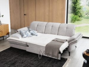 Miniaturka 4 - Narożnik rozkładany Trevalio z rozłożoną funkcją spania w salonie