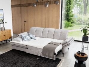 Miniaturka 5 - Rozłożony narożnik Trevalio z otomaną w salonie