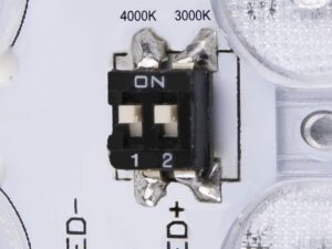 Miniaturka 10 - Detal przełącznika CCT w antracytowej oprawie Ainos Square Sensor